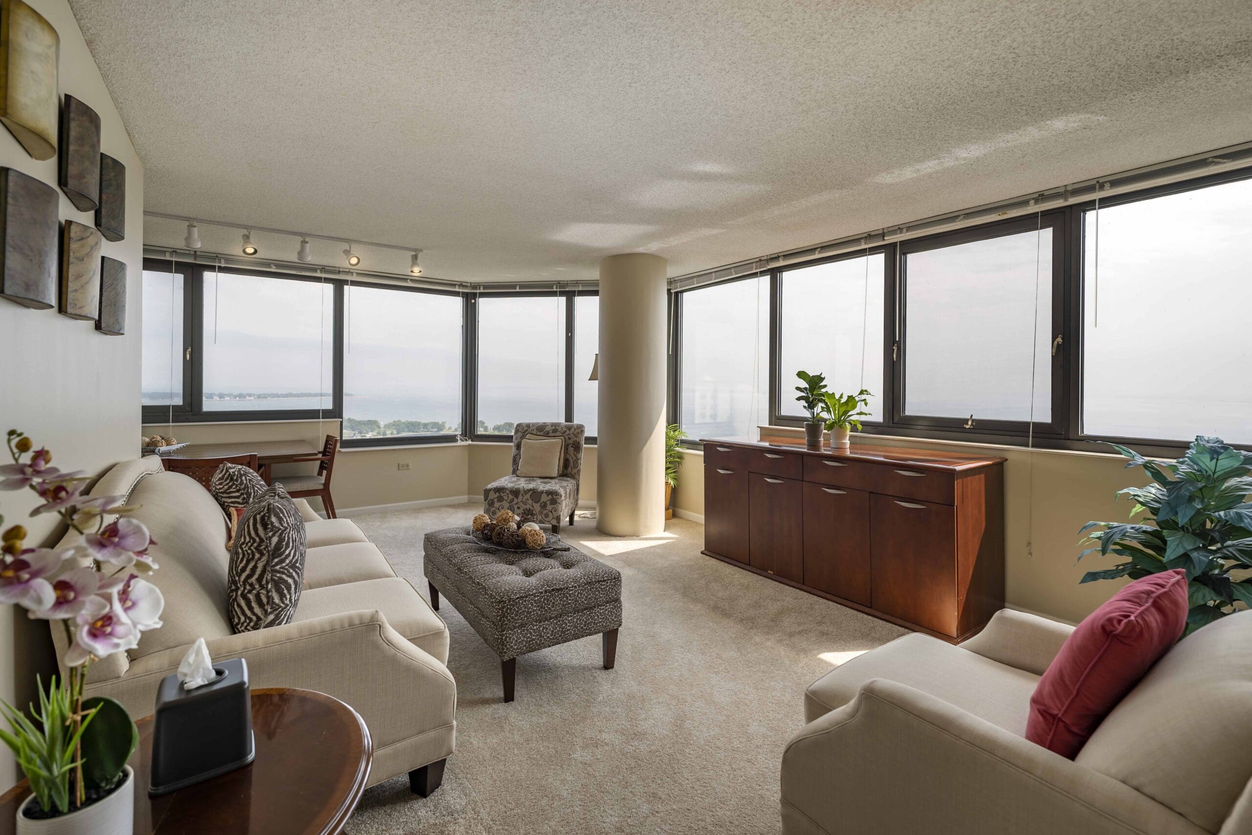 Final Selects - CS3_0002 - The Hallmark Resident apartment at The Hallmark, a living room with big windows and natural light.