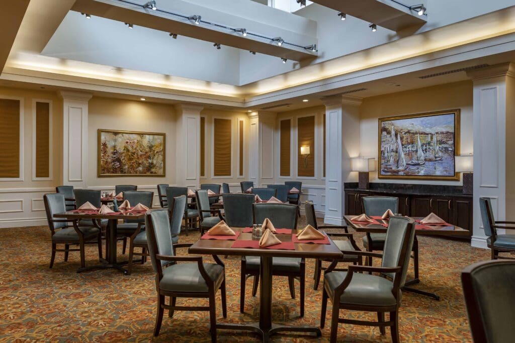 Final Selects - CS3_0019 - The Hallmark The Hallmark dining room with comfortable seating and flatware.